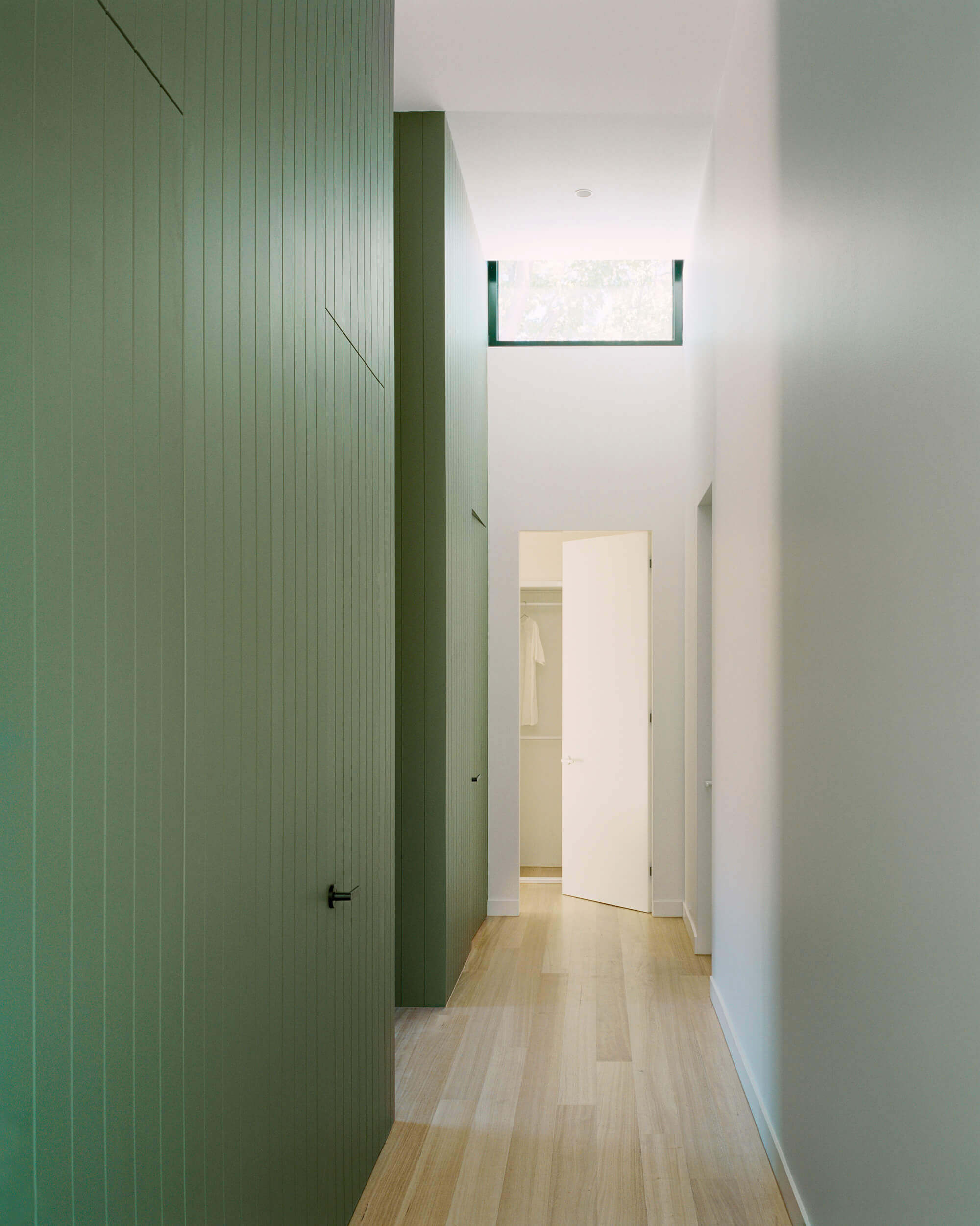 Concealed Door in Olive Green Wall. Ellul Architecture. Sandringham House
