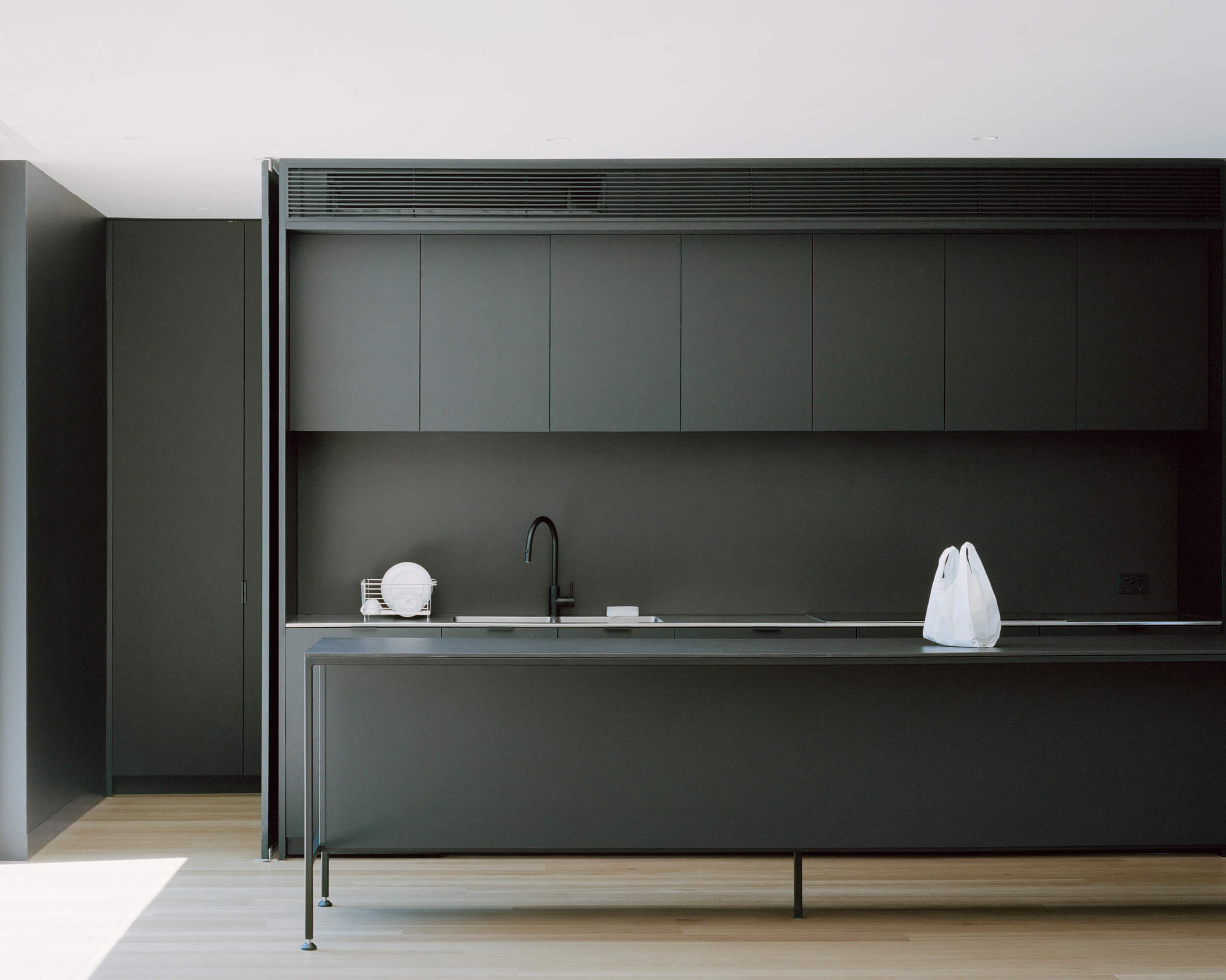 Minimal black kitchen. Ellul Architecture. Sandringham House.