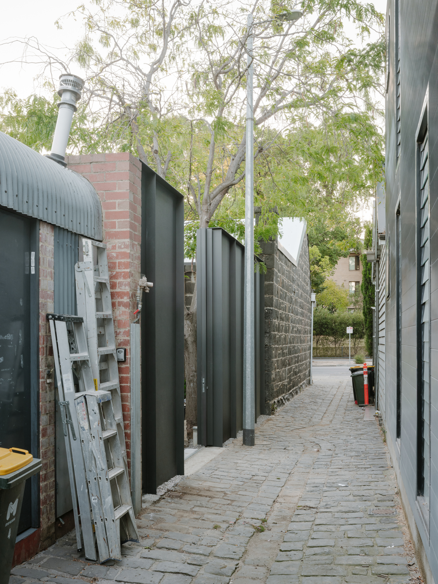 Bluestone House. Ellul Architecture. Carlton. Laneway. Courtyard. Operable Facade