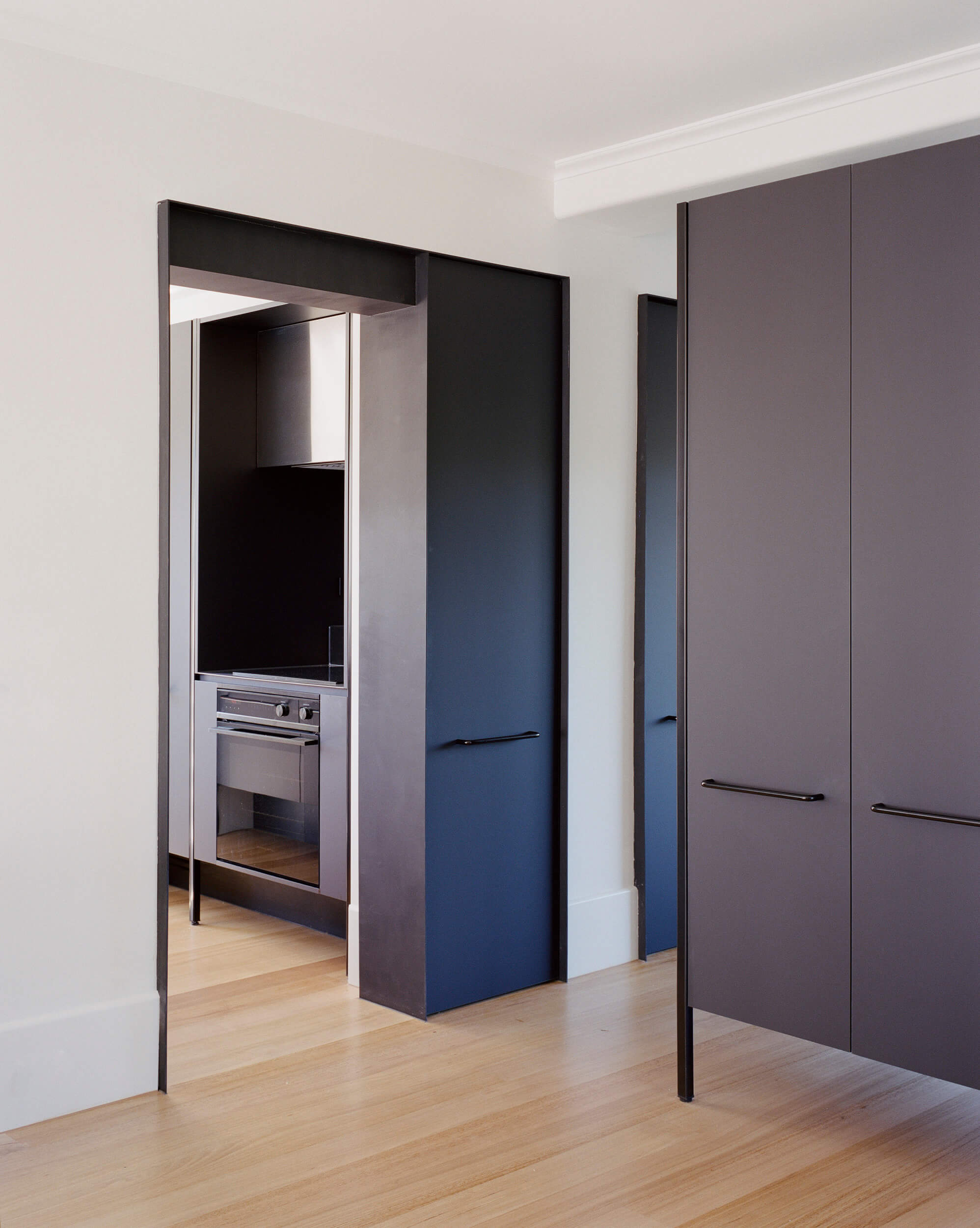 Kitchen Joinery on steel legs. Ellul Architecture. Caringal Flats